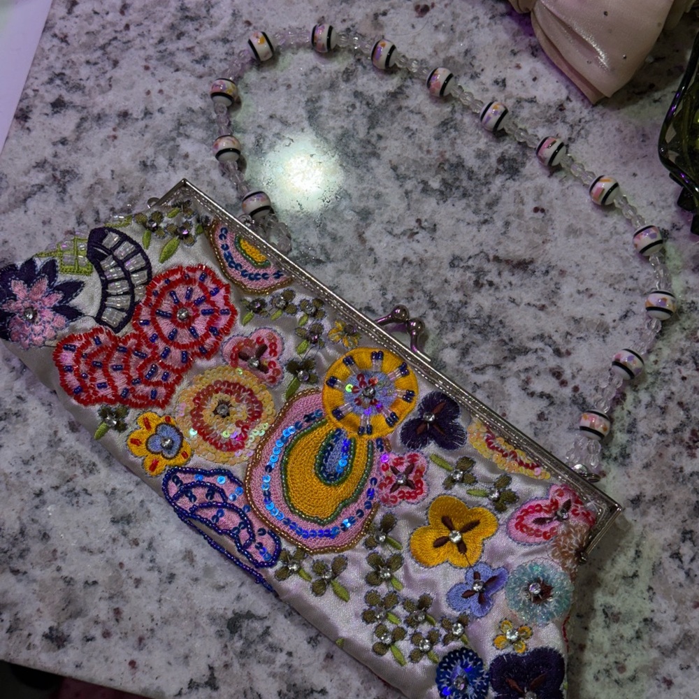 Red and Pink Floral Clutch with Artistic Design